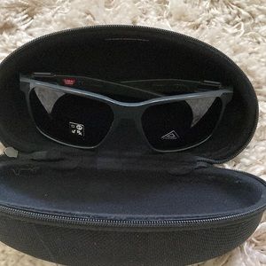 Brand new with case Oakley sunglasses the rubber nose piece needs adjusting.